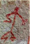 Cueva de las Manos (prov. Santa Cruz, Patagonia Argentina), antropomorfo en pintura lineal roja y guanacos en pintura cuerpo lleno (fragmento). Foto DF.